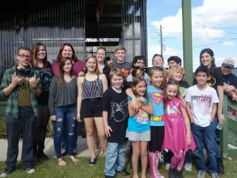 a group of people posing for a photo