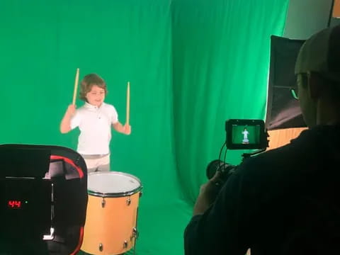 a child playing drums