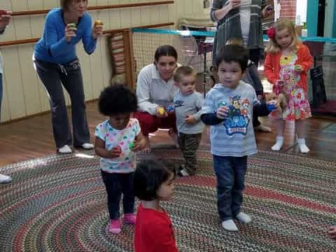 a group of children playing with toys