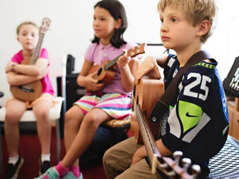 a group of children playing instruments
