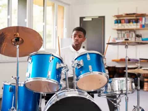 a person playing drums