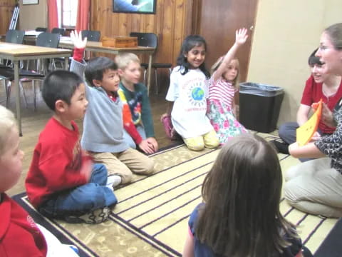 a group of children sitting on the floor