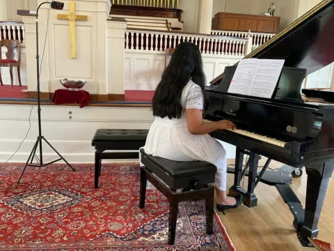 a person playing a piano