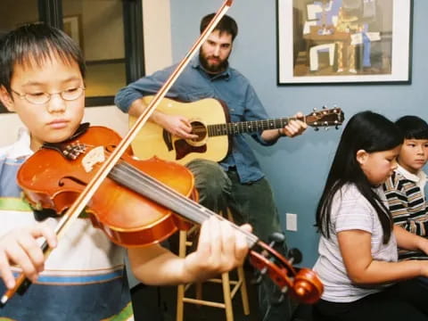 a group of people playing instruments