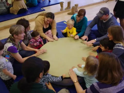 a group of people sitting around a table