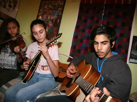 a group of men playing guitars