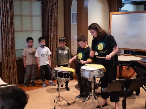 a group of kids playing instruments