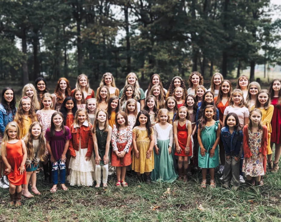 a group of people posing for a photo