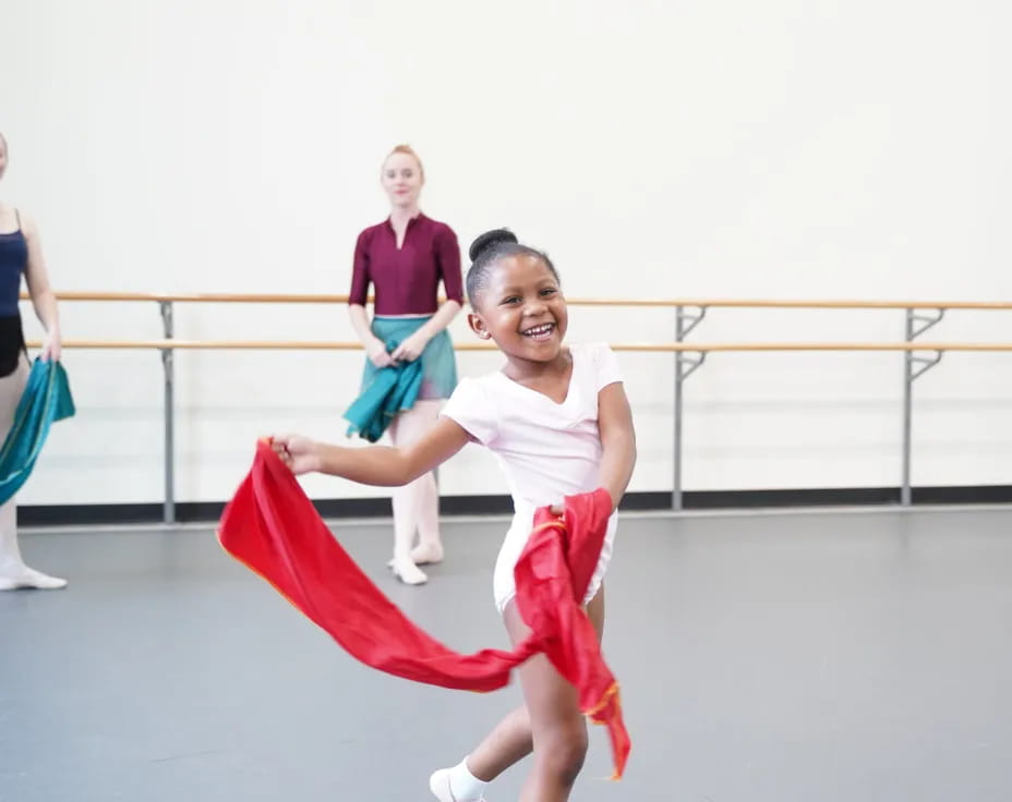 a girl in a karate uniform