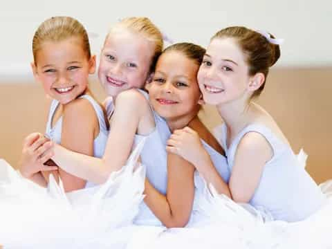 a group of children posing for a photo