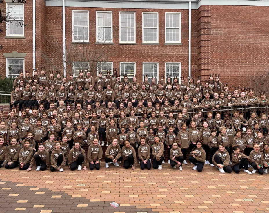 a large group of people posing for a photo