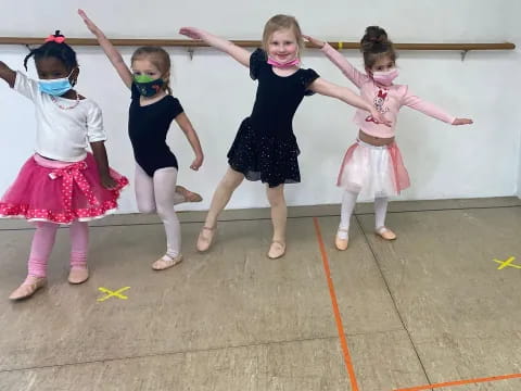 a group of girls wearing clothing