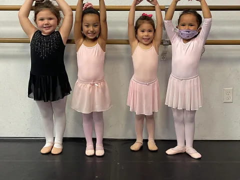 a group of girls posing for a photo