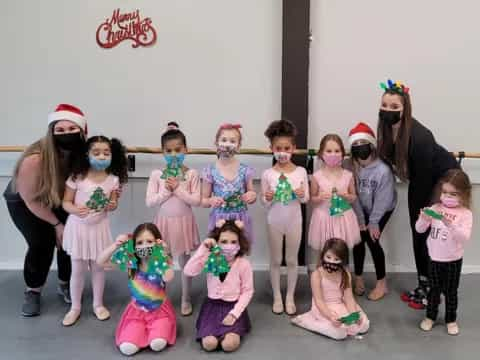 a group of children posing for a photo