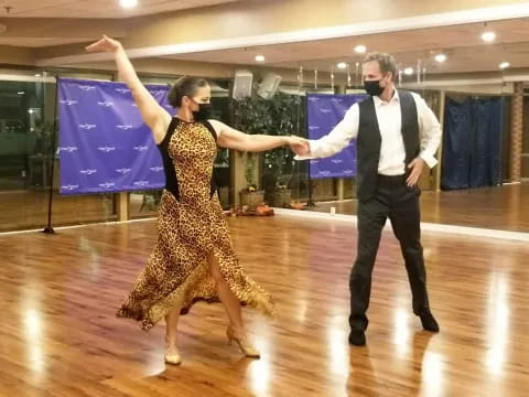 a man and woman dancing