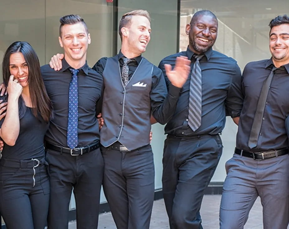 a group of people posing for a photo