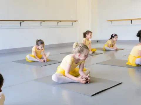 a group of children sitting on the floor