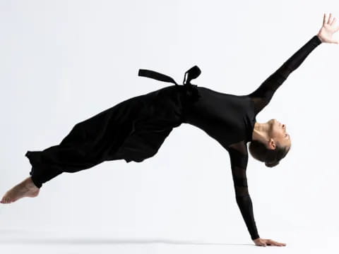 a person doing a handstand