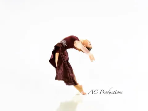 a person dancing on a white background