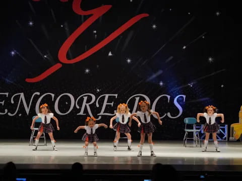 a group of women on a stage