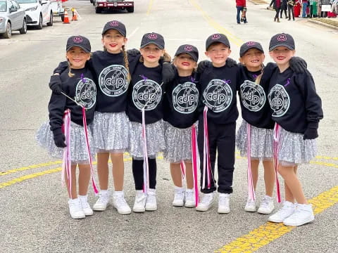 a group of kids posing for a photo