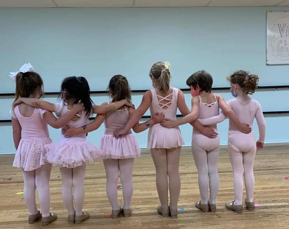 a group of girls in a gym