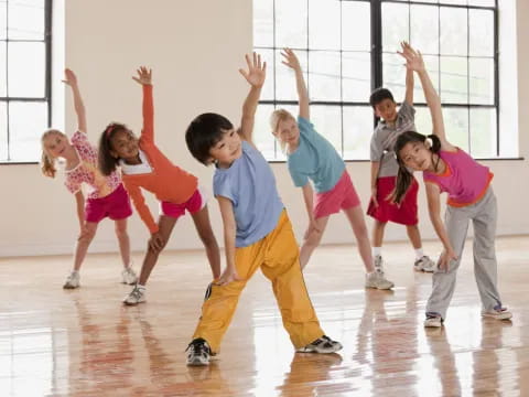 a group of children dancing