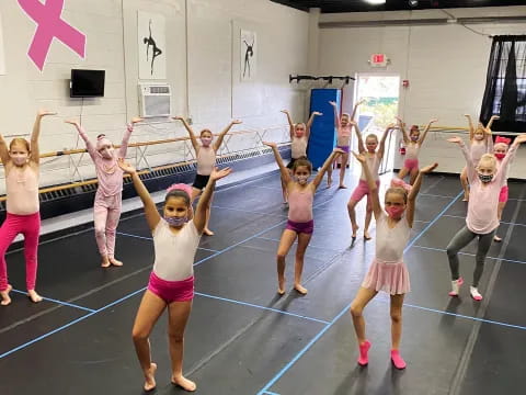 a group of girls in a gym