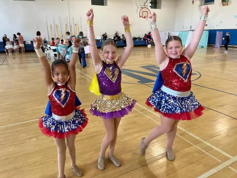 a group of girls in a gym