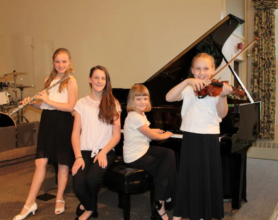 a group of women playing instruments