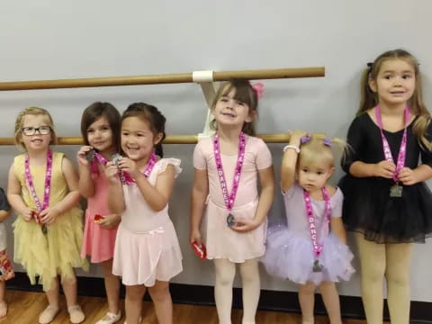 a group of girls posing for a photo