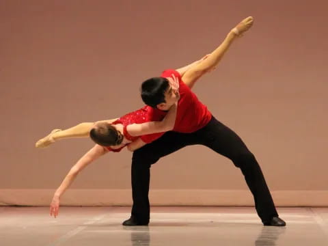 a man and woman dancing