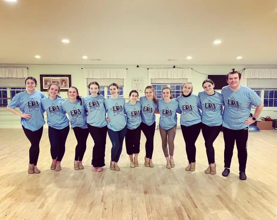 a group of people wearing matching t-shirts