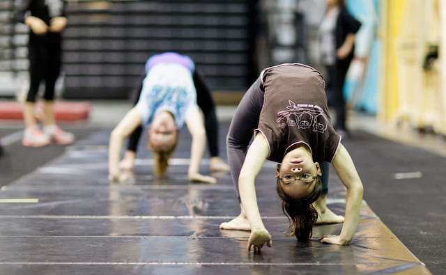 a group of women doing push ups