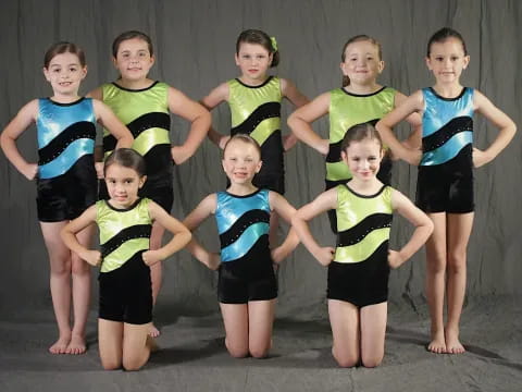 a group of children in matching shirts