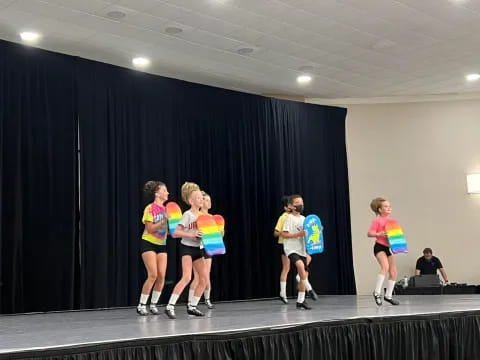 a group of women on a stage