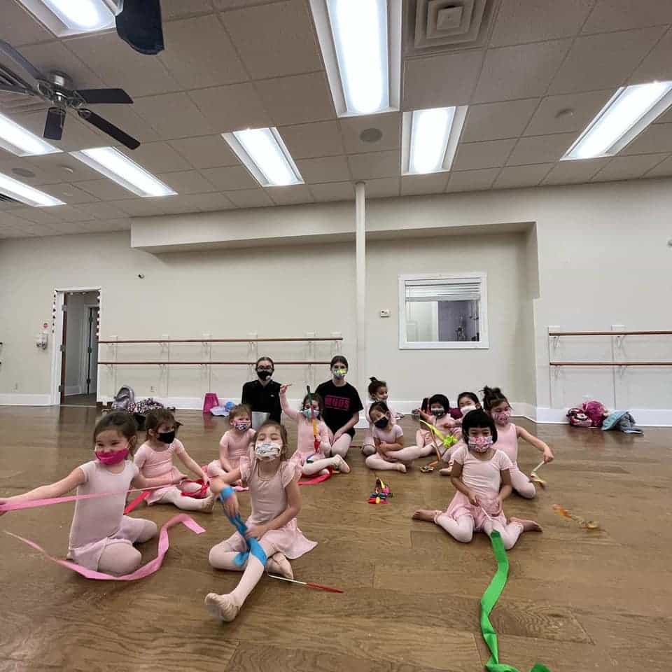 a group of children playing in a room
