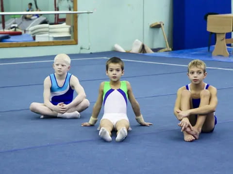 a group of children sitting on the floor
