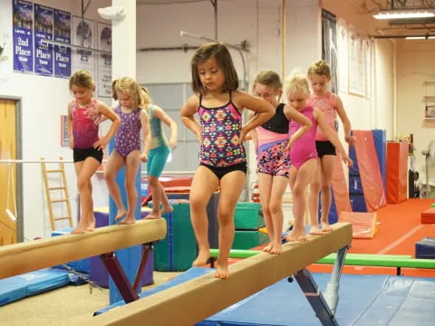 a group of girls in a gym