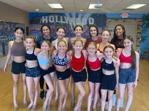 a group of women in athletic wear