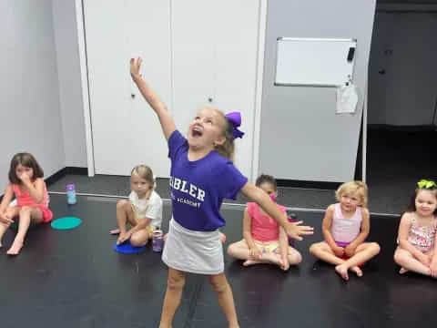 a girl in a purple shirt