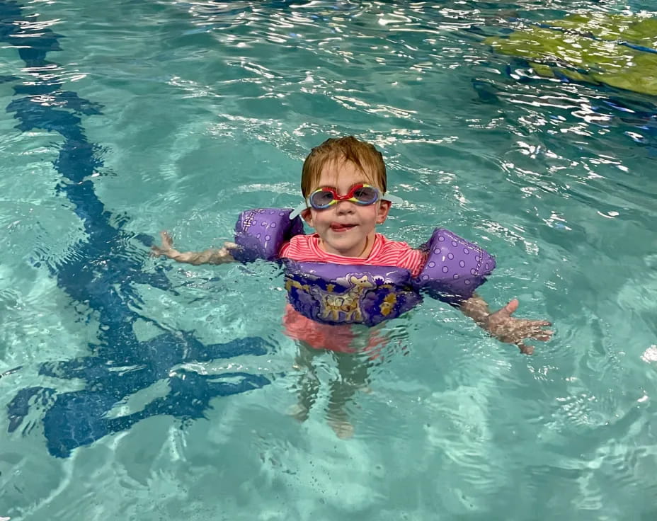 a child in a pool