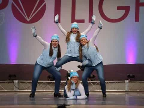 a group of women on a stage