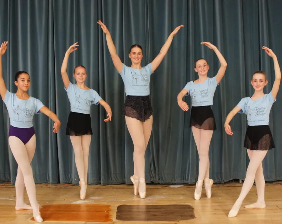 a group of girls on a stage