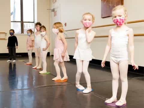 a group of children wearing clothing