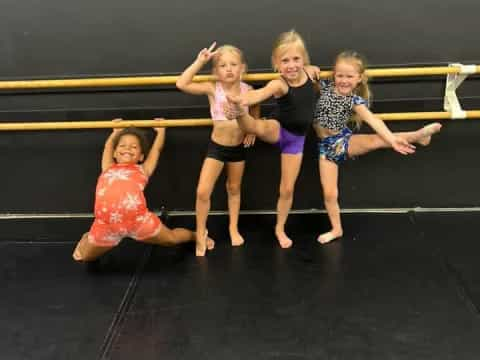 a group of girls posing for a picture