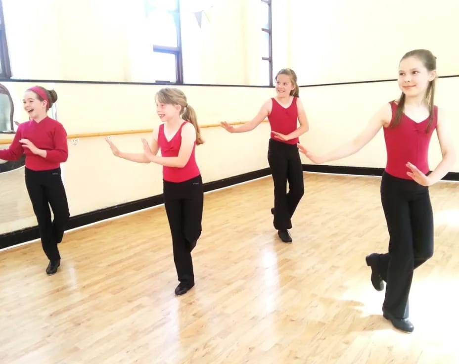 a group of women dancing