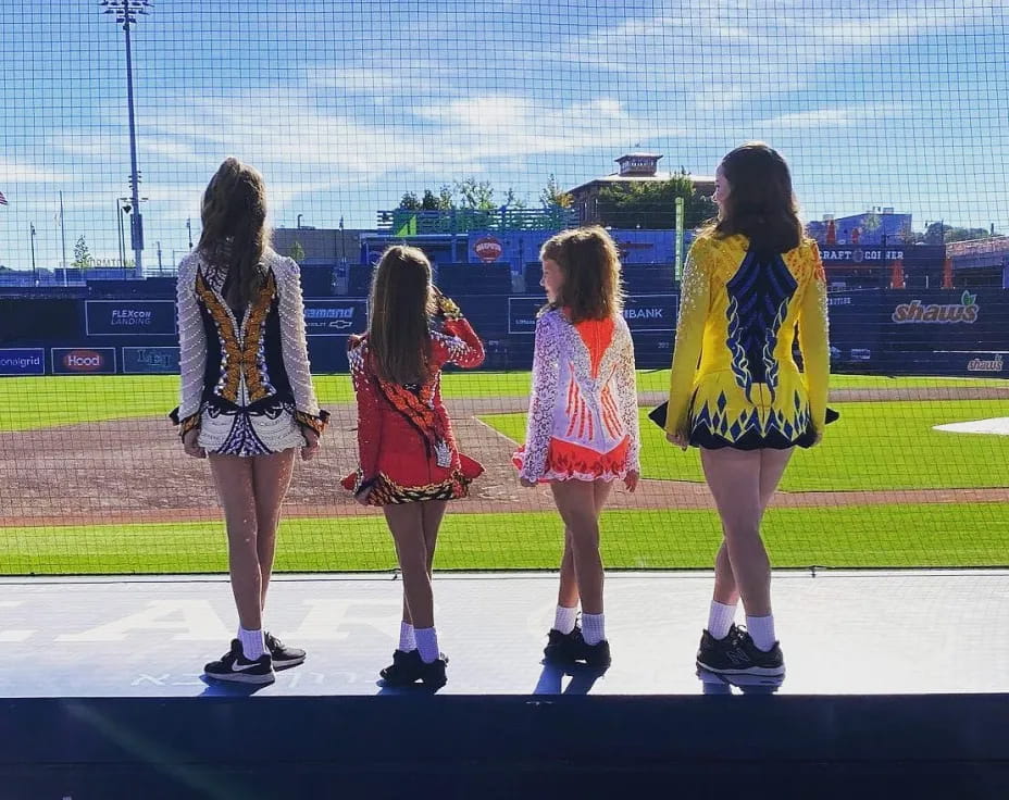 a group of girls on a stage