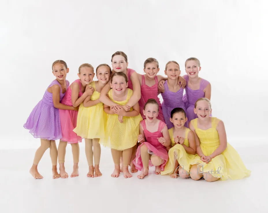 a group of girls posing for a photo