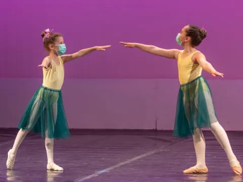 a couple of women dancing